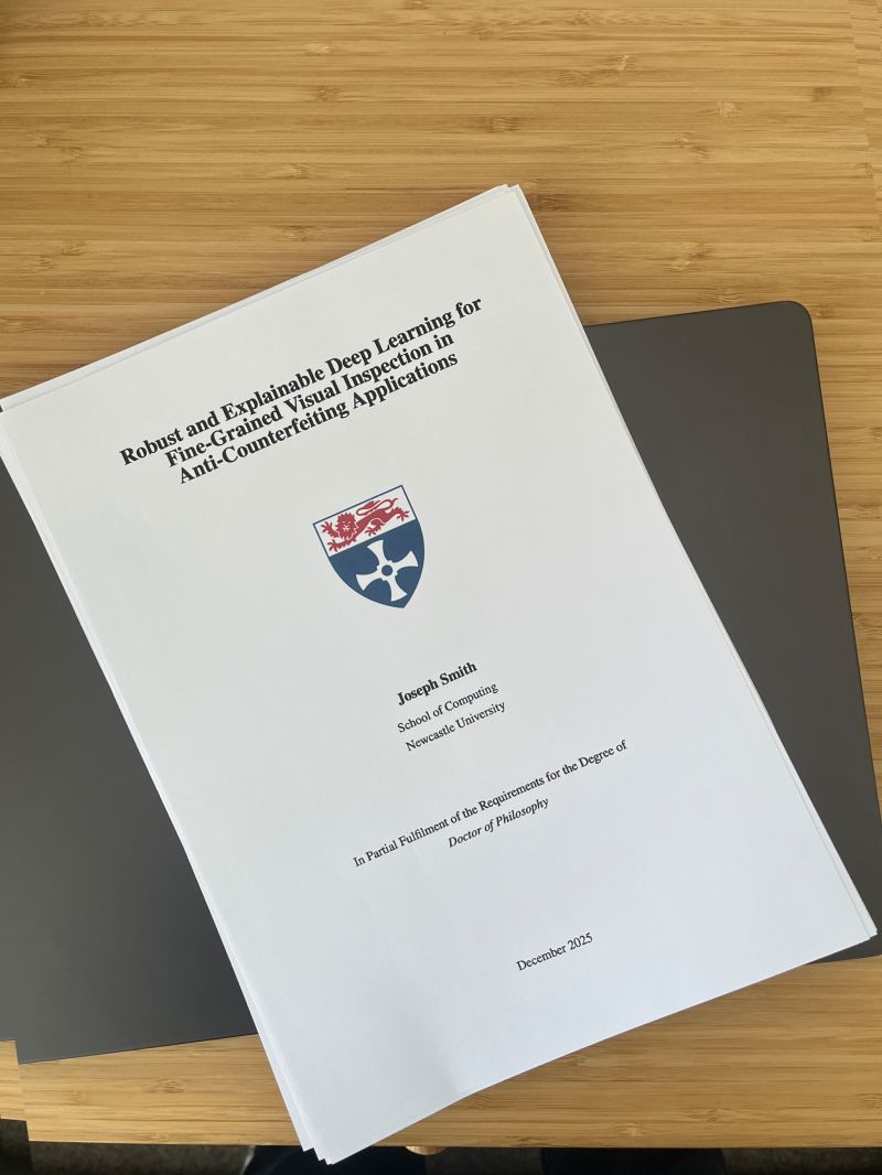 Printed PhD thesis cover for Robust and Explainable Deep Learning for Fine-Grained Visual Inspection in Anti-Counterfeiting Applications